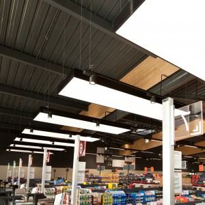 Eclairage d'un supermarché 100% LED, zone caisses